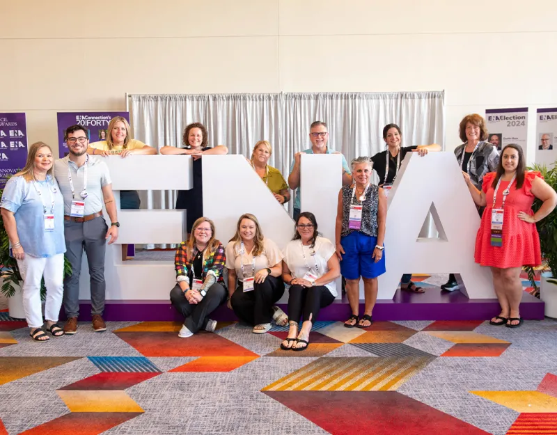 Group of People with the ENA sign